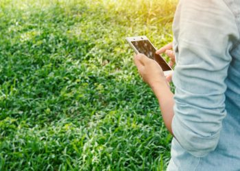 close-up-girl-touching-screen-her-mobile close-up-girl-touching-screen-her-mobile